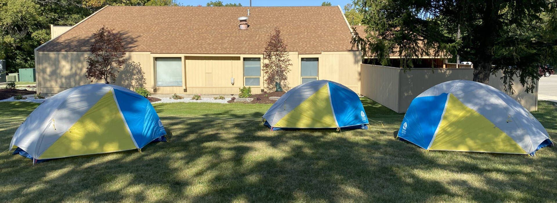 3 OA tents in the lawn outside the Ravines Center